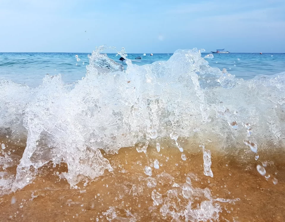 Mesmerizing Close-Up of Waves Crashing on Tioman Island’s Beach